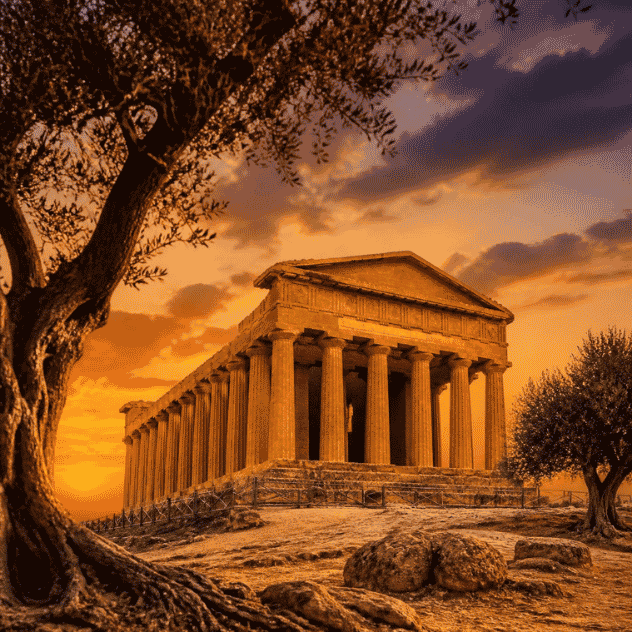Doric sandstone columns of the ancient Temple of Concordia in Agrigento during sunset in Sicily.